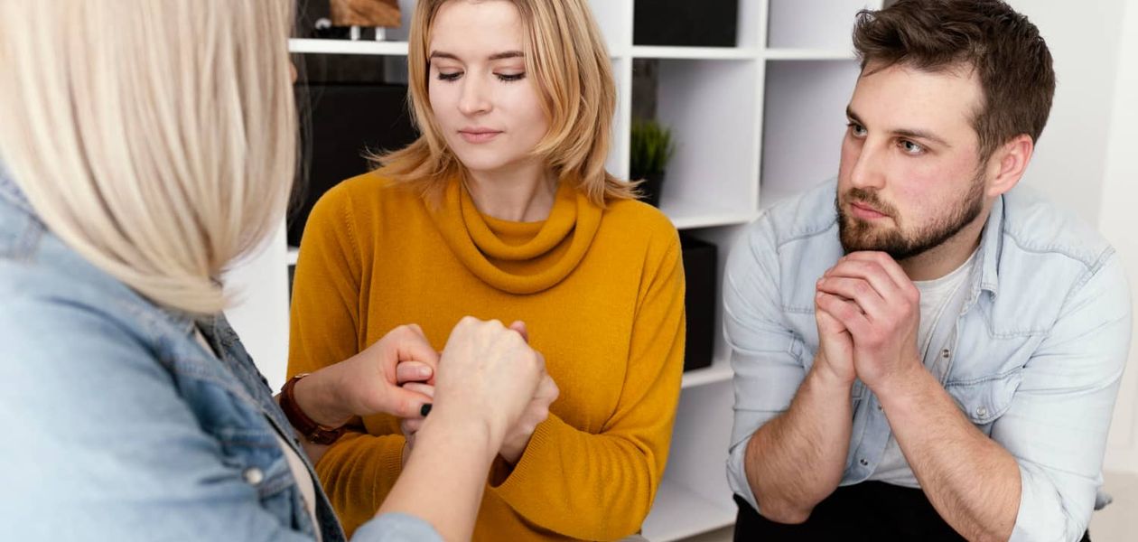 two people in a therapy session