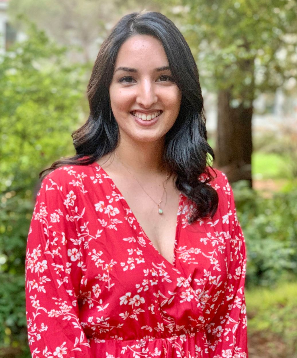 therapist in foreground speaking with a blurred woman in the background