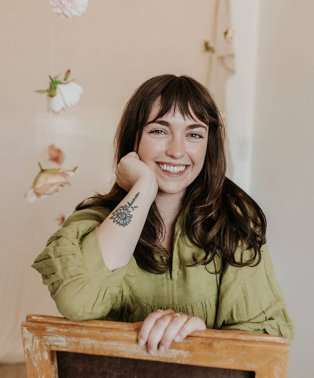 therapist in foreground speaking with a blurred woman in the background